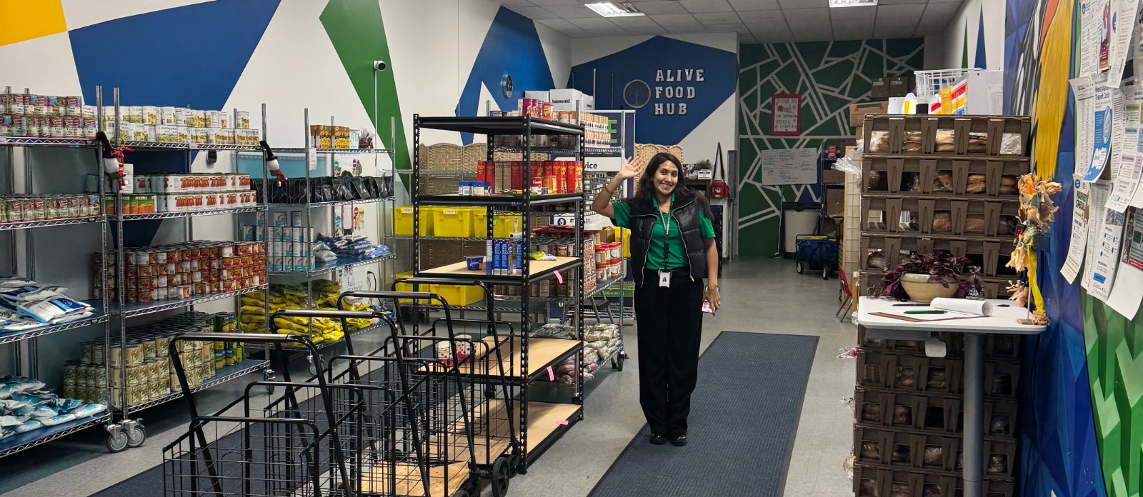 A DFCU Employee volunteering at food pantry